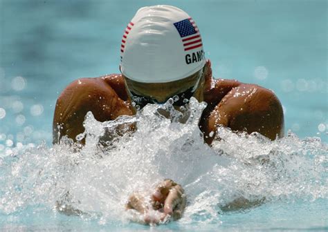 Why Do Swimmers Wear Swim Caps? And Why Do Fish Never Get Wet?